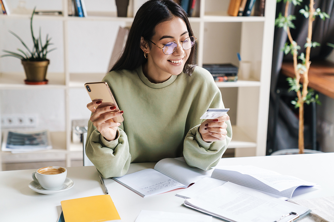 Woman shopping online with smartphone