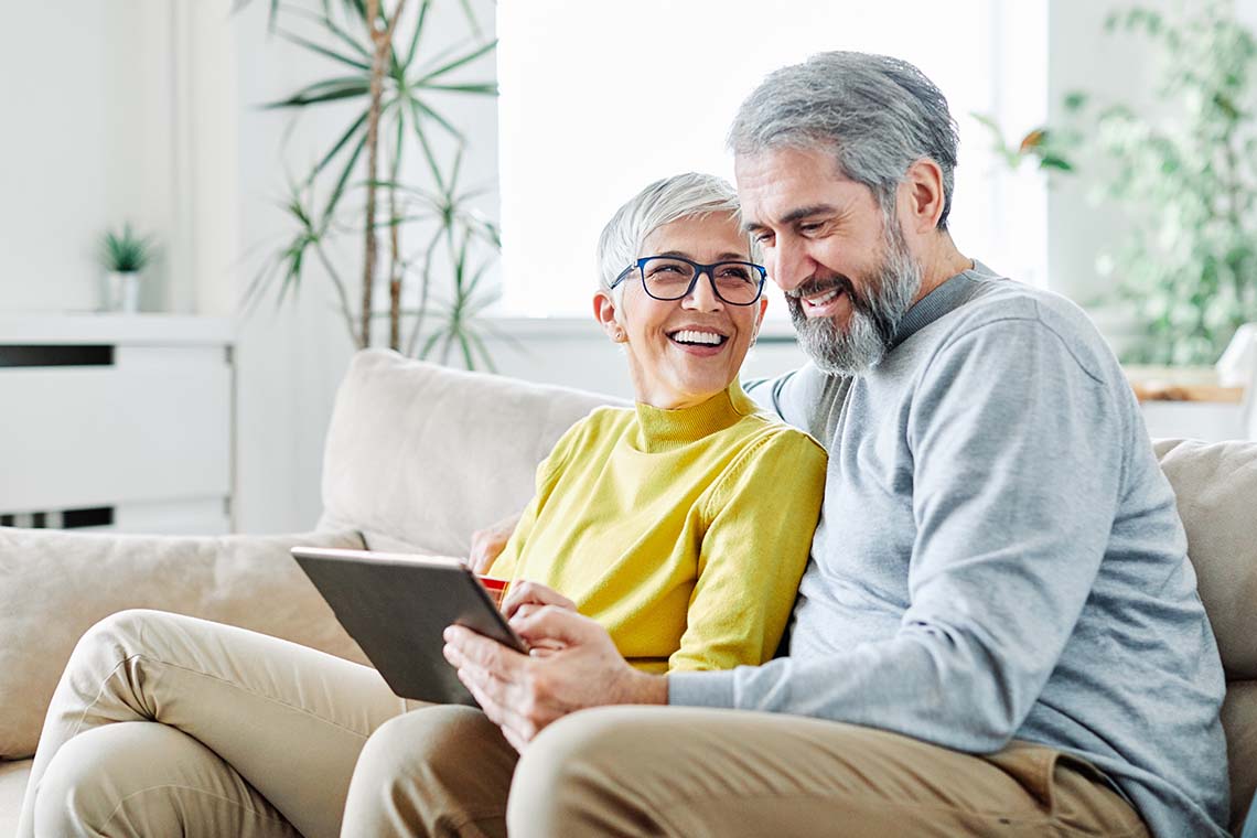 older couple enjoying tech-savvy gifts for grandparents