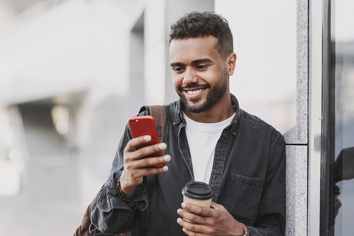 person checking valentines day apps on new smartphone