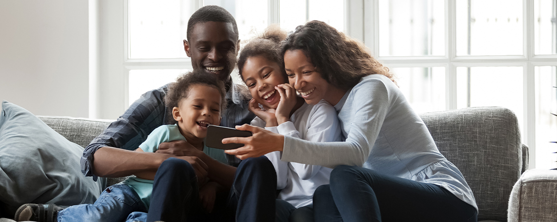 family streaming movie on tablet with Verizon 5G Get More plan