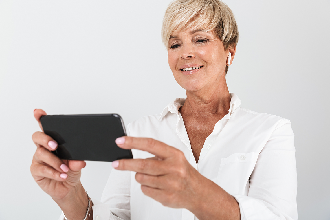 woman checking email on smartphone