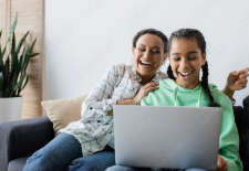 mother and daughter laughing