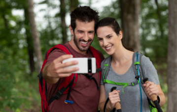 couple hiking woods