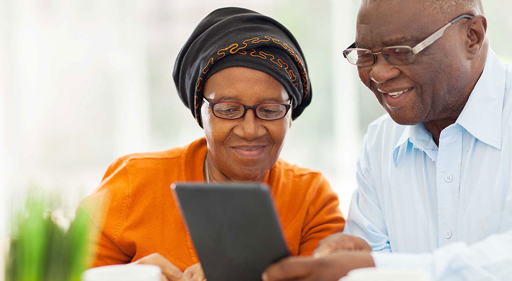 couple looking at tablet together
