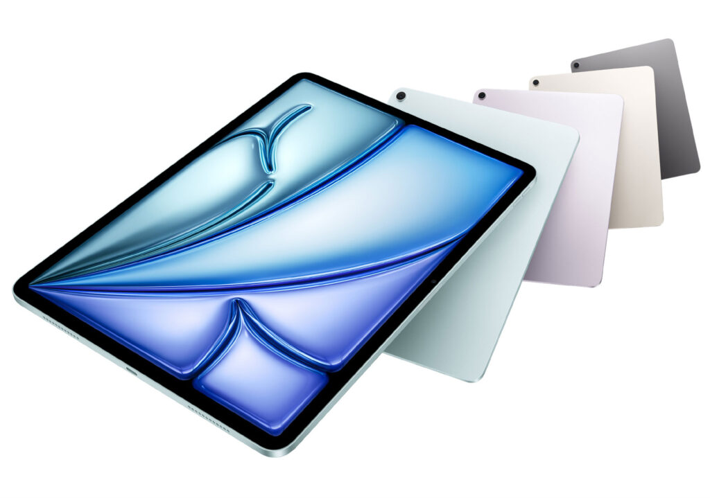 A row of 2024 Apple iPad Air tablets. The first shows a colorful display background. The rest are shown from the back in each available color, including a light blue, light purple, starlight (a light gold shade), and dark gray.