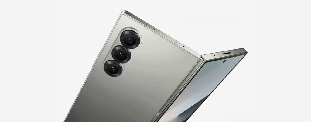 Samsung Galaxy Z Fold6 opened and at an angle, showing three camera lenses.