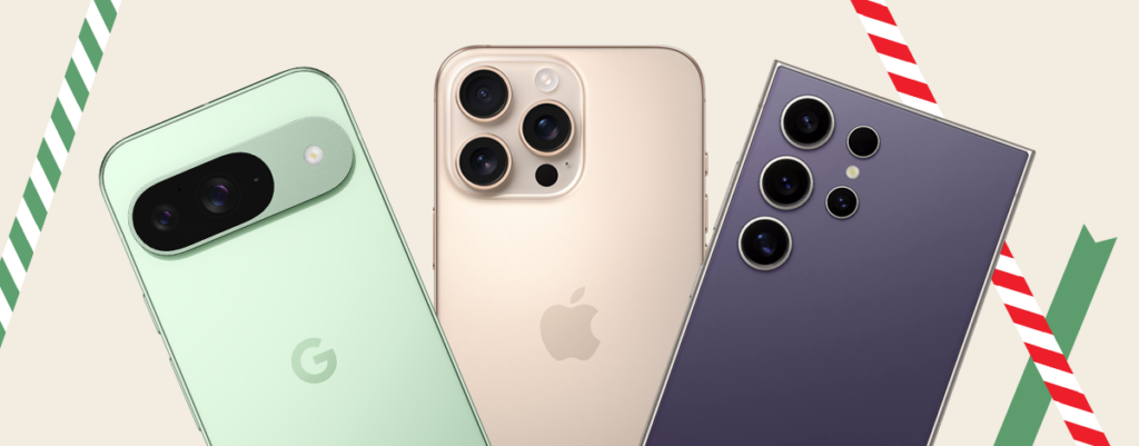A trio of smartphones against a beige background with festive striped tape. From left: Google Pixel 9 in Wintergreen, Apple iPhone 16 Pro in Desert Titanium, and Samsung Galaxy S24 in Titanium Gray.